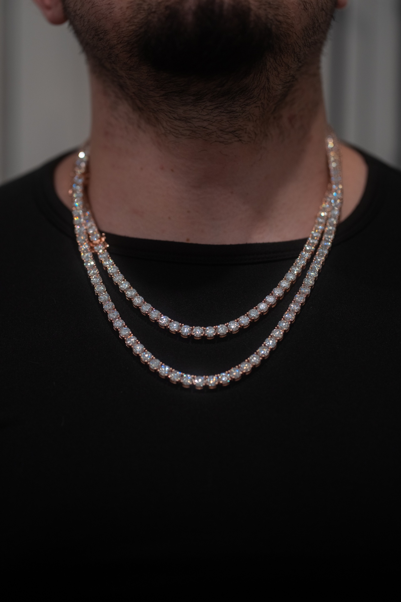 6mm 22 inch rose gold moissanite tennis chain worn on a model