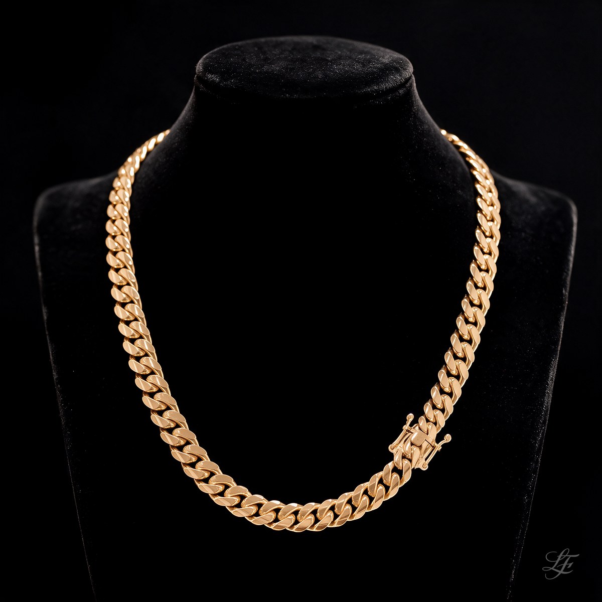 14kt gold bonded silver Cuban link chain, 10mm width, shown on a display bust. Ships from Florida